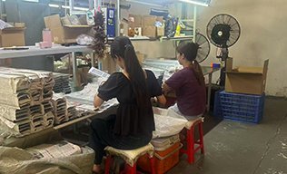 worker selecting and checking products